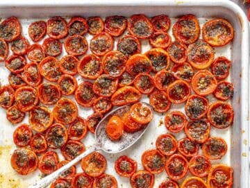 Step 3 Tomato confit finished with pan juices spooned over caramelized roasted tomatoes.