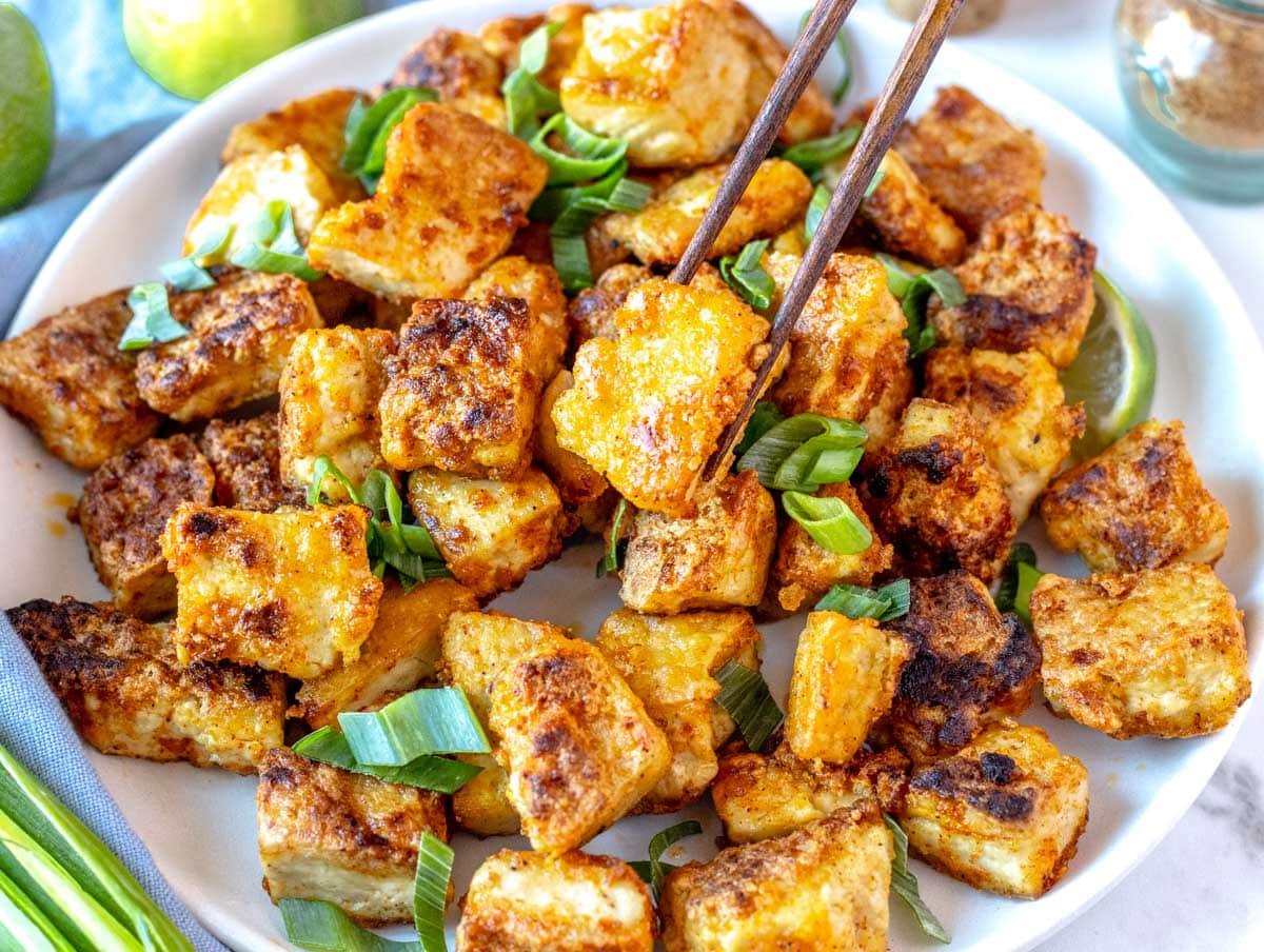 fried tofu served on a white plate