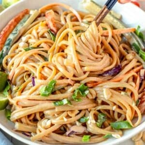 peanut noodles with scallions and chopsticks