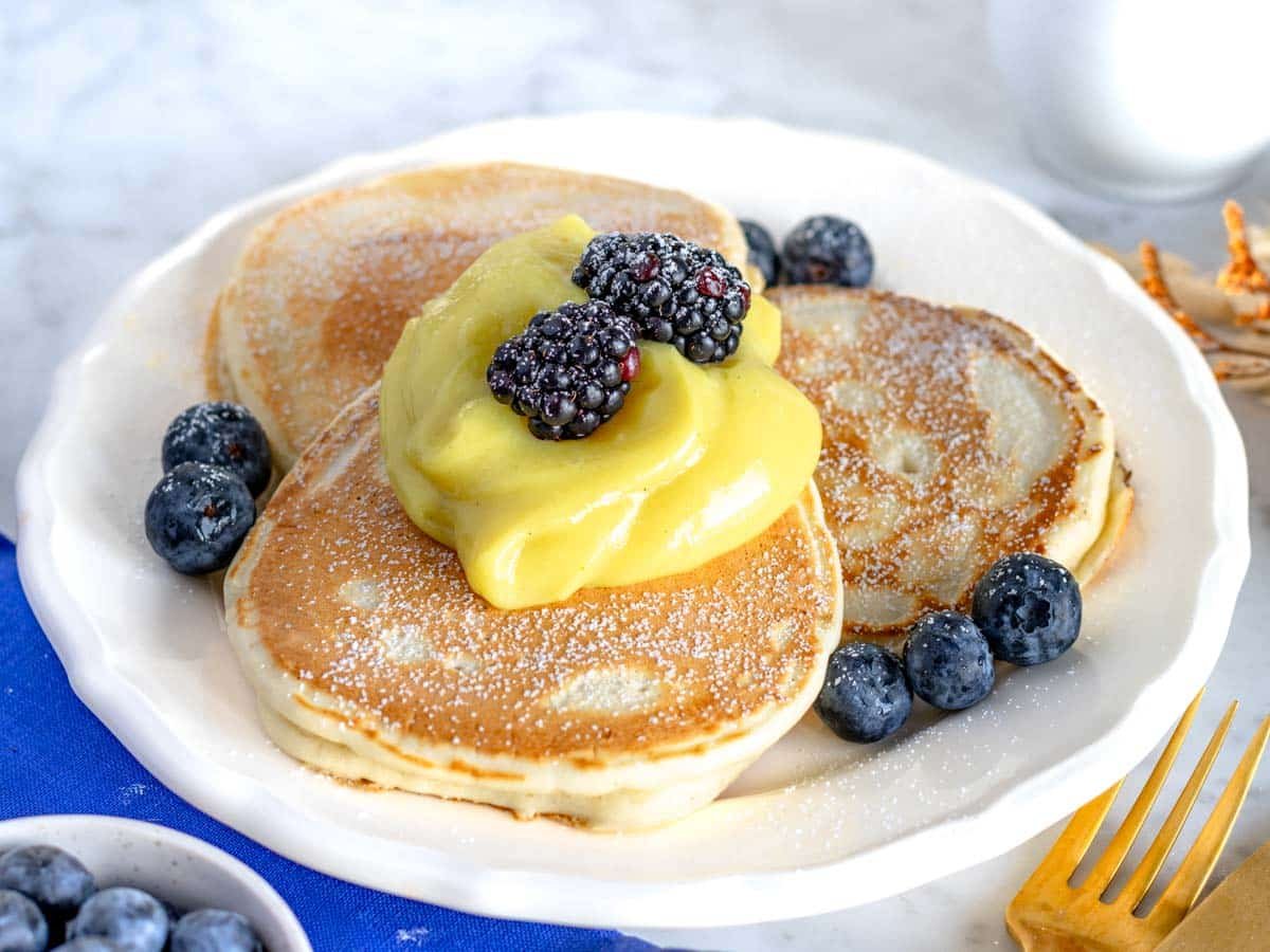 vegan pancakes served with vegan custard.