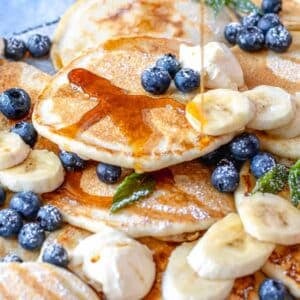 vegan pancakes with maple syrup and blueberries