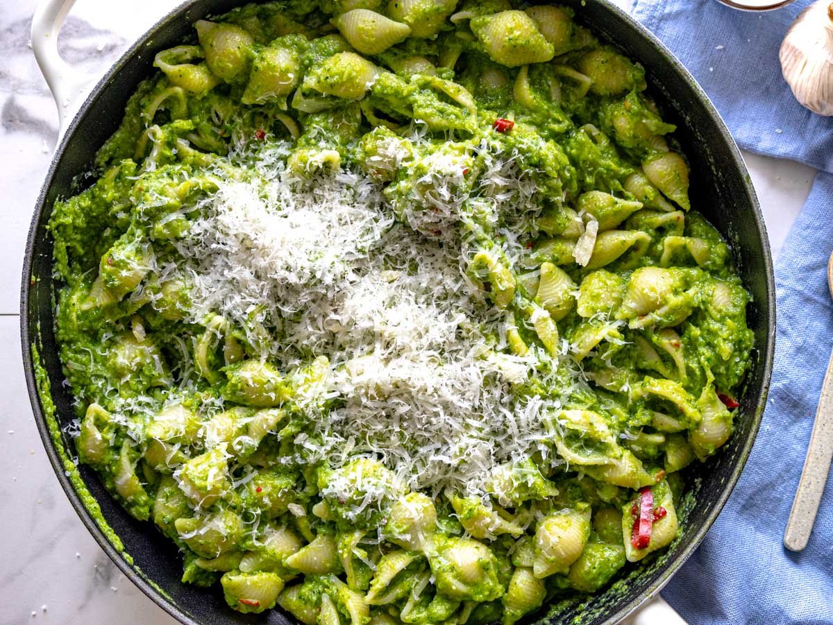 grated parmesan cheese on broccoli pasta