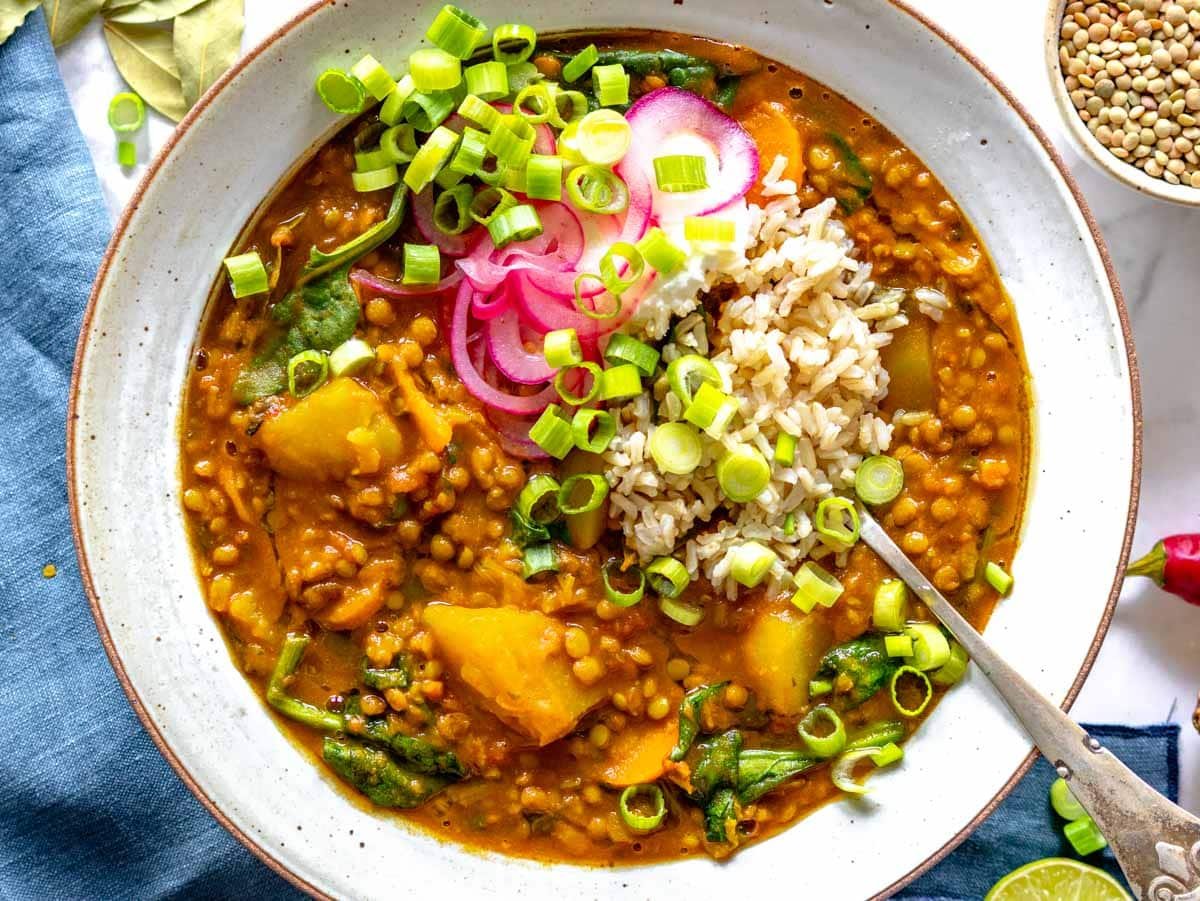 curry lentil soup in a white hand-made bowl