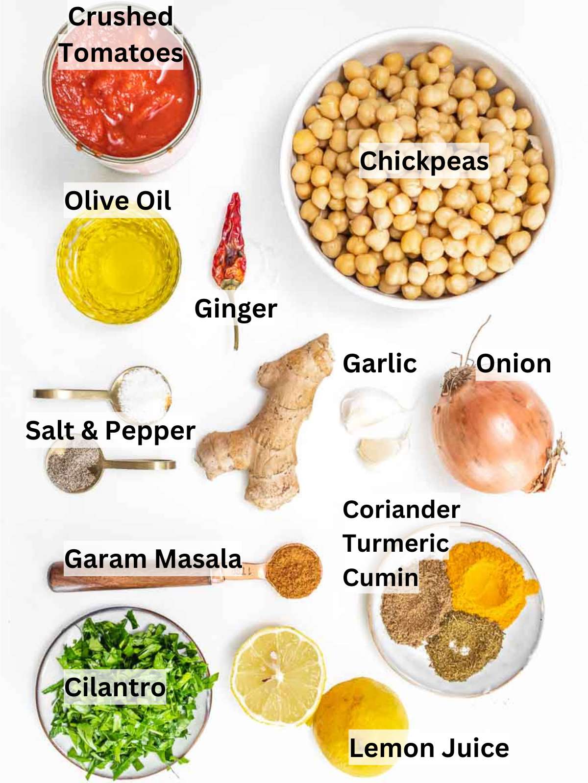 Ingredients for chana masala including chickpeas onion garlic ginger tomatoes and spices.