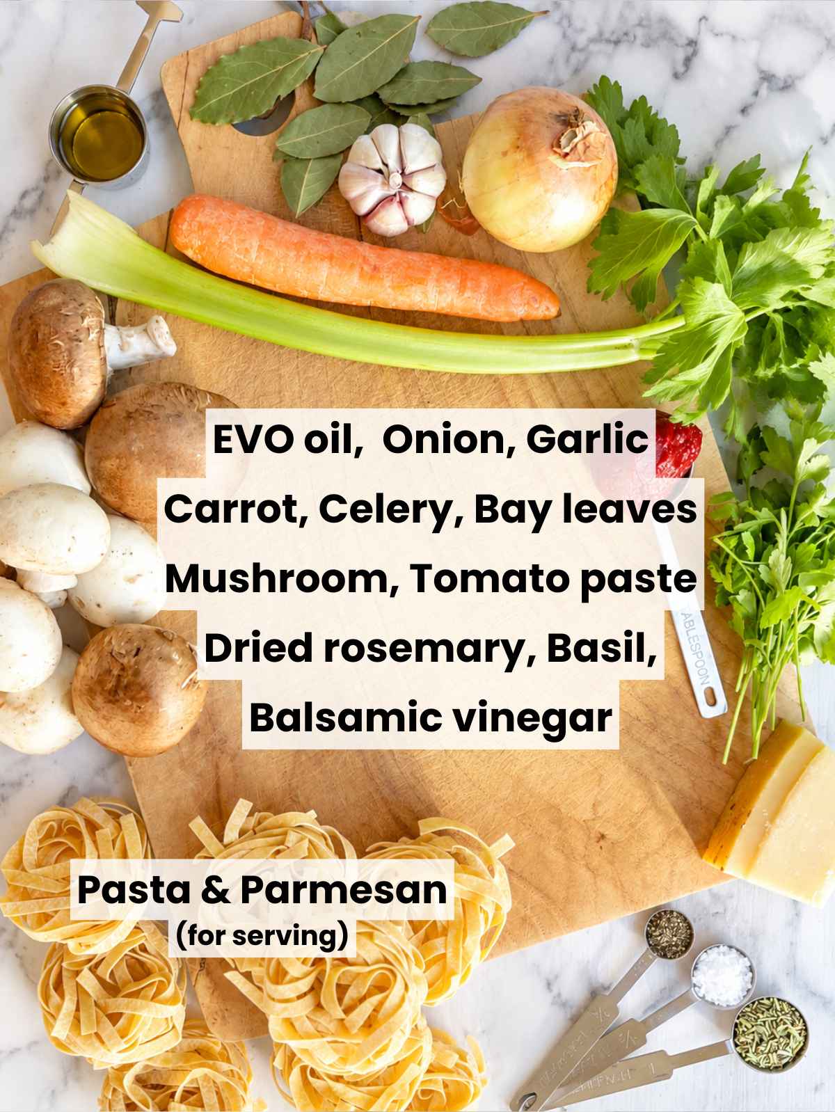 Ingredients for mushroom ragu on a table.