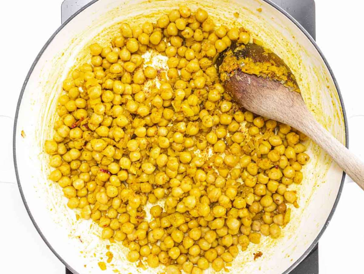 Step 2 Chickpeas added to skillet coated in the spiced onion garlic base.