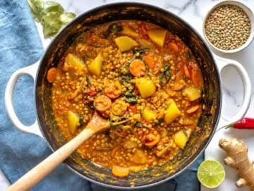 Step 3 Curry lentil soup simmering until lentils and potatoes are tender.