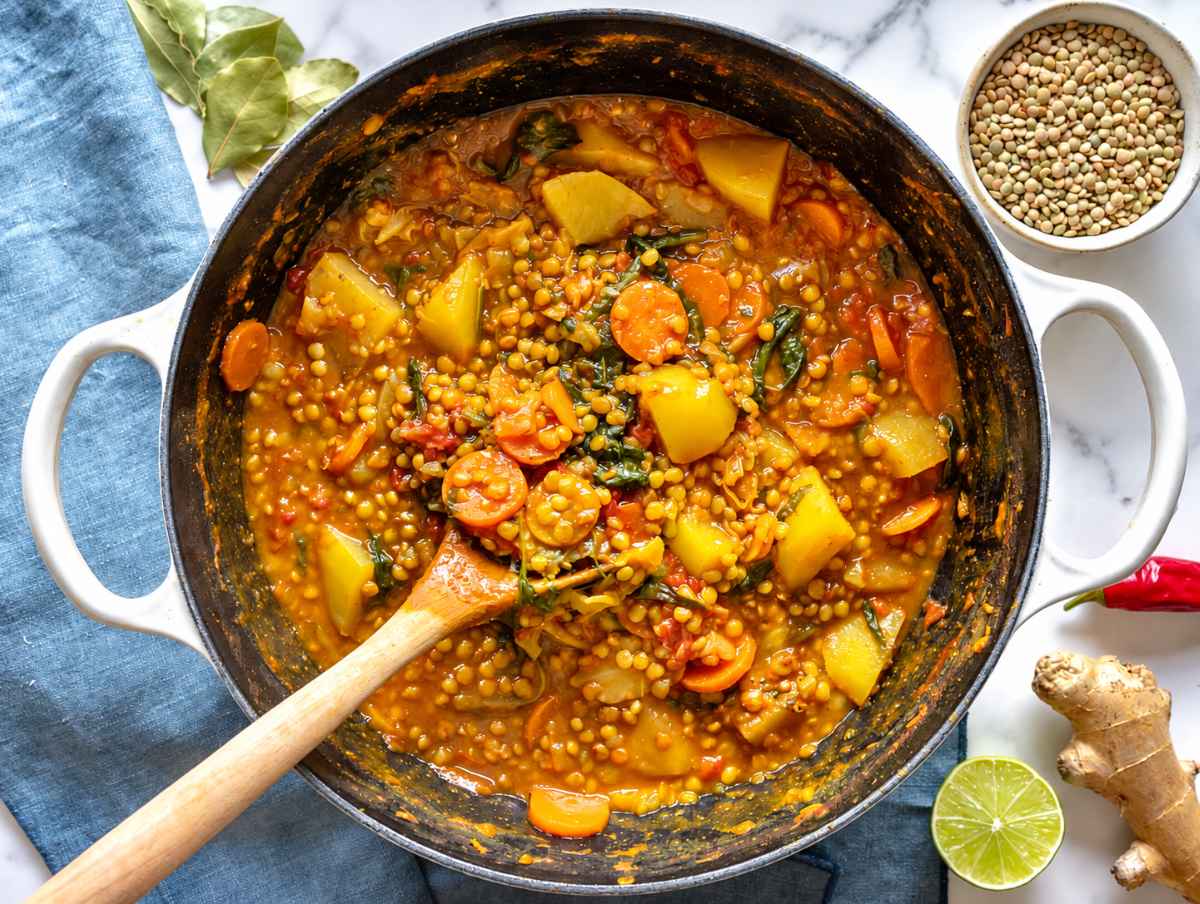 Step 3 Curry lentil soup simmering until lentils and potatoes are tender.