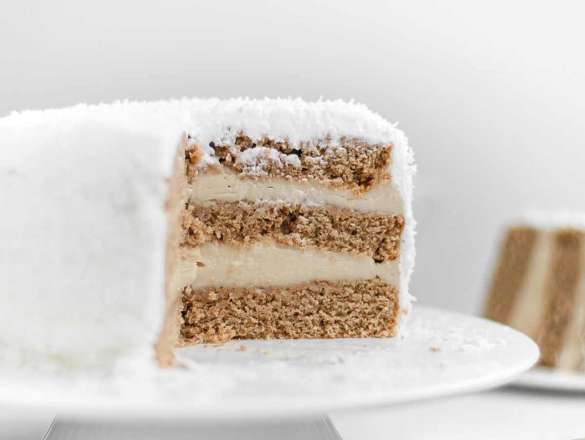 vegan coconut cake on a cake platter