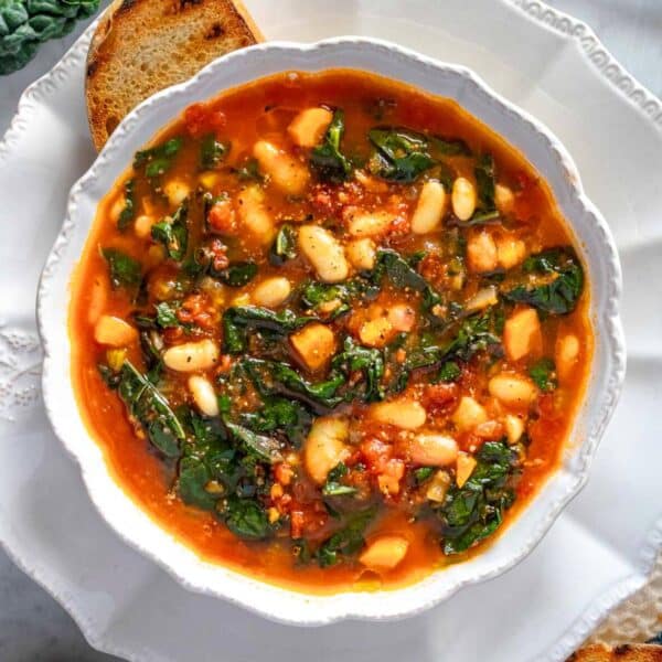 Kale soup in white bowl