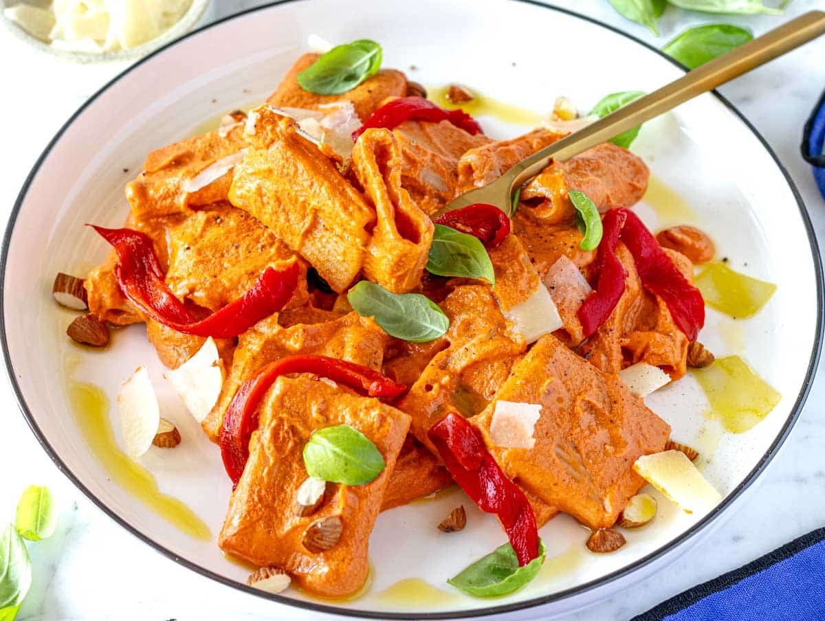 roasted red pepper pasta topped with roasted bell peppers