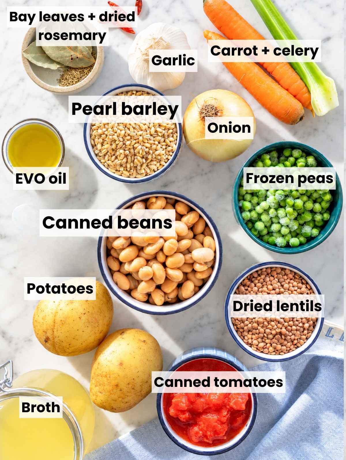 Barley soup ingredients with beans, potatoes, vegetables, lentils, and frozen peas