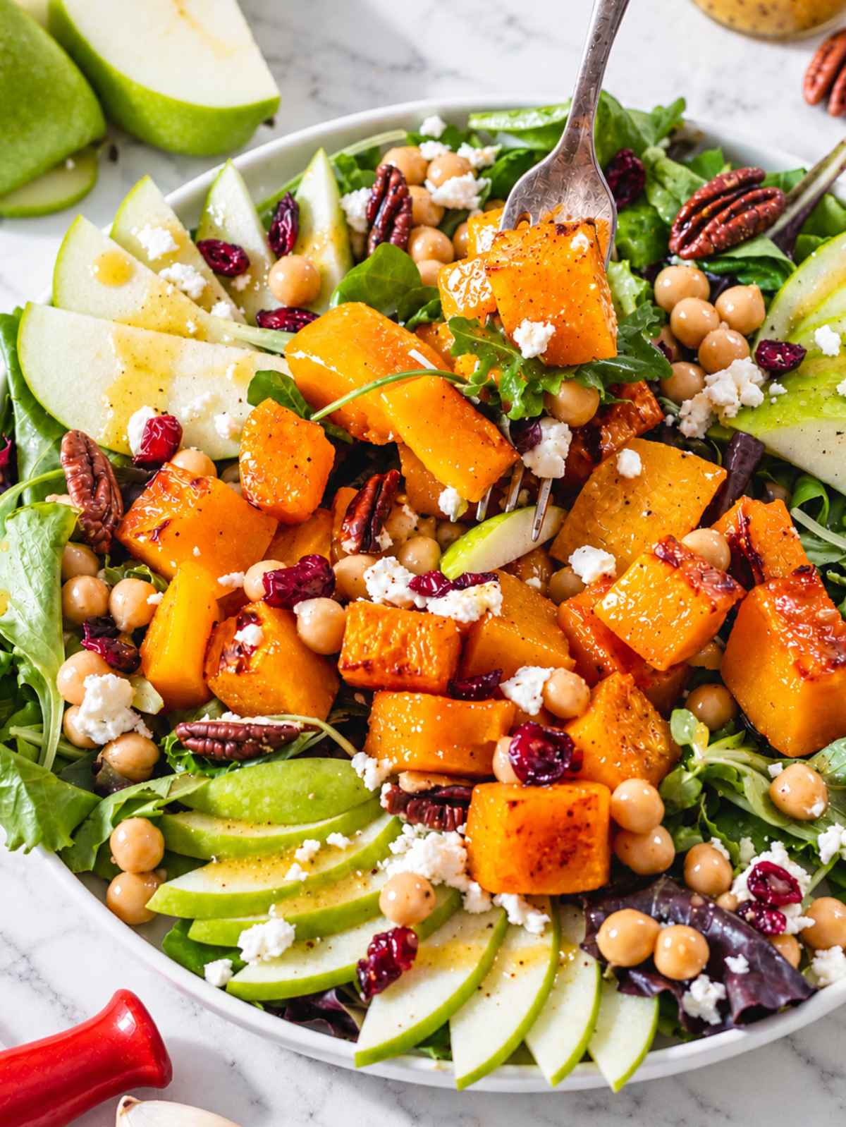 Butternut squash salad with chickpeas, apple, feta, pecans, and cranberries.