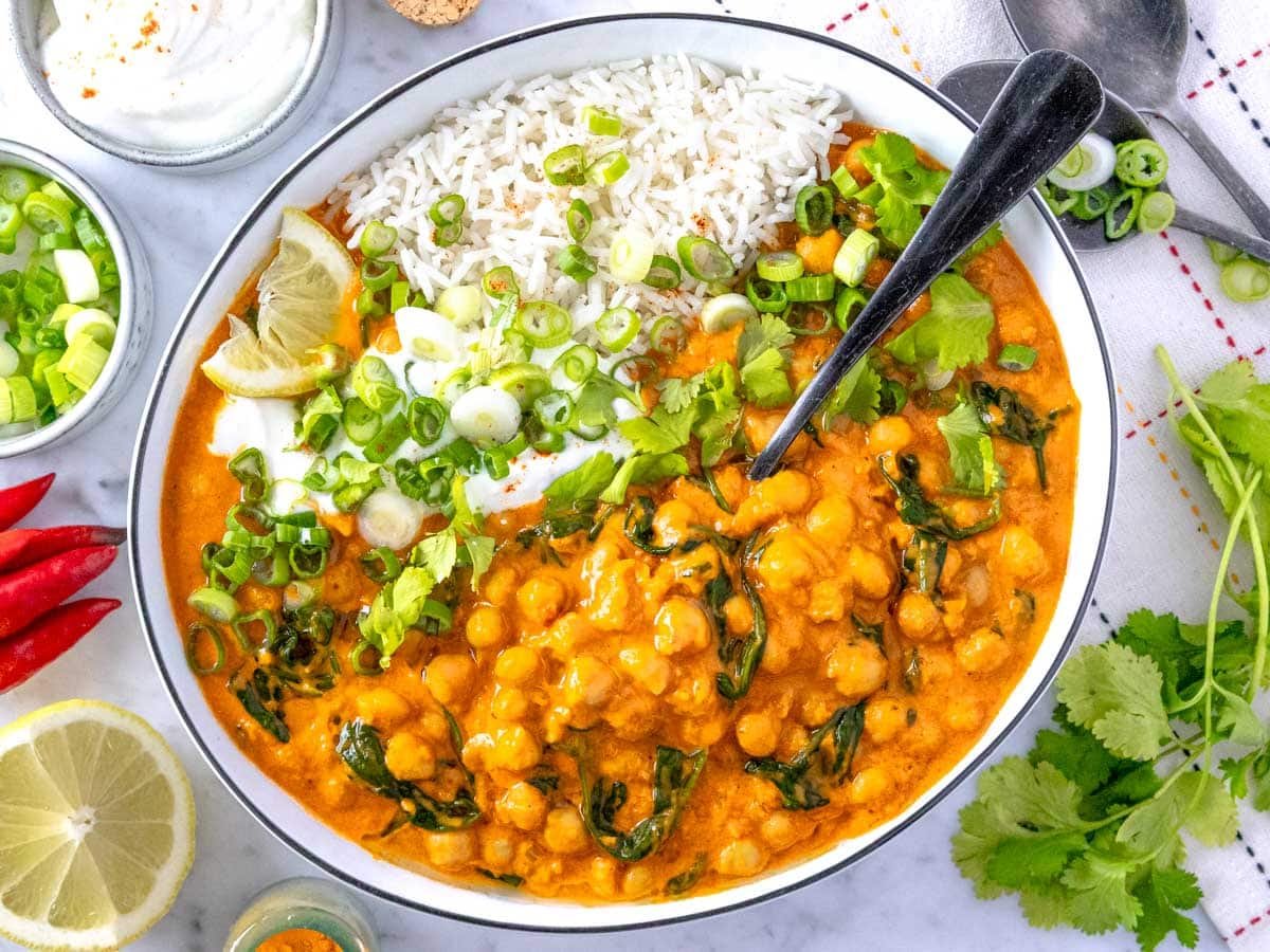 Chickpea curry with rice and lemon.