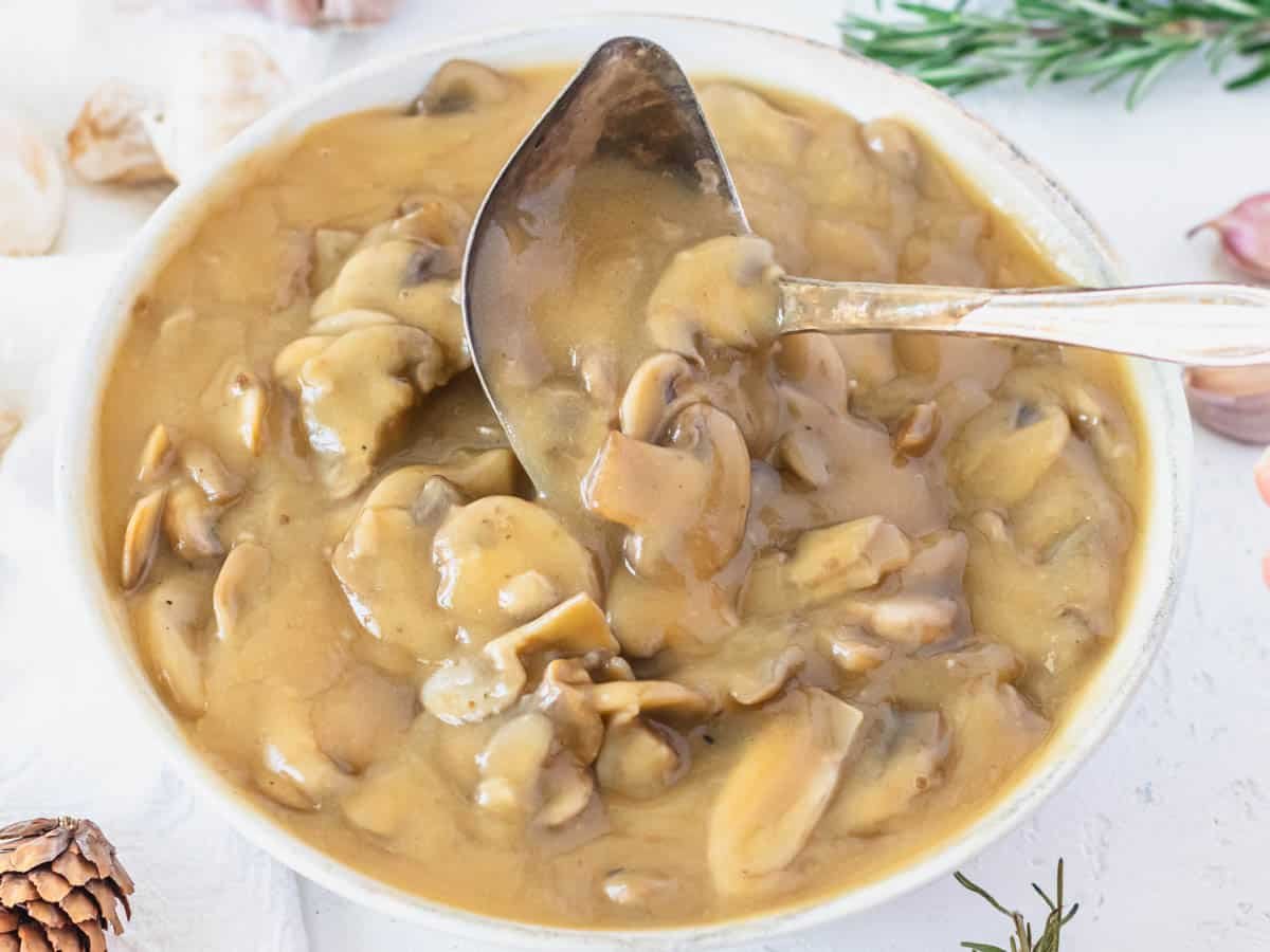 Mushroom gravy in a serving bowl