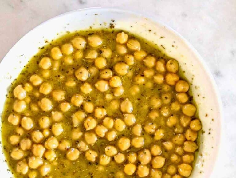 Step 2 Chickpeas tossed in glossy mustard dressing and left to marinate.