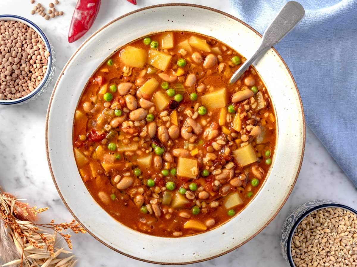 Barley and lentil soup in a hand-made bowl.