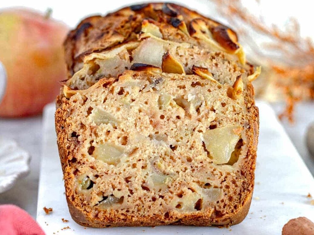 Apple bread on a marble cutting board.