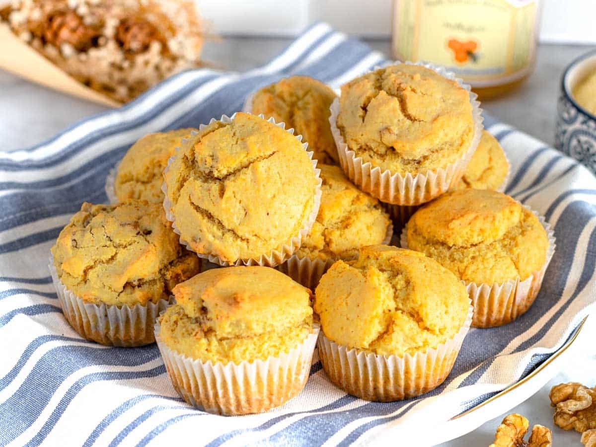 Cornbread muffins after baking on a blue cloth