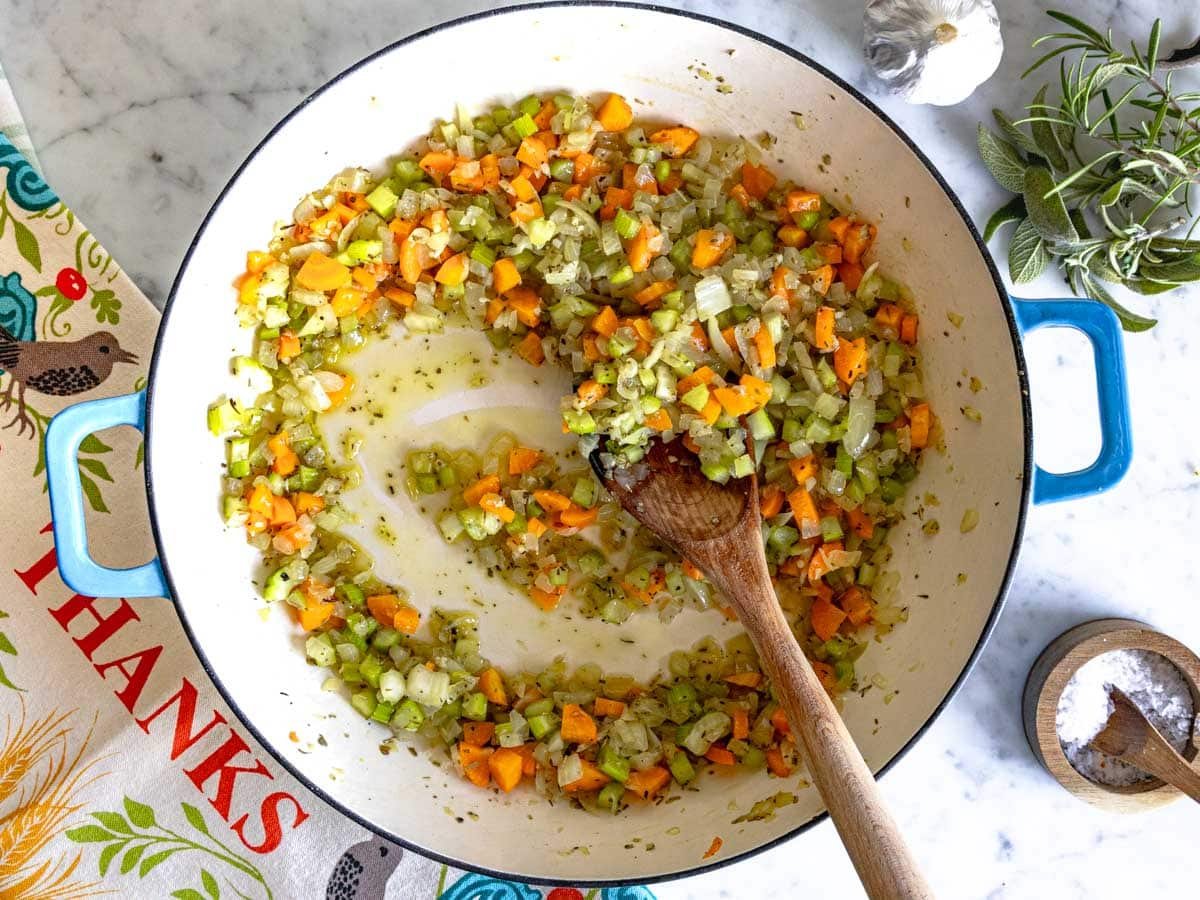 soffrito for cornbread stuffing in a blue skillet