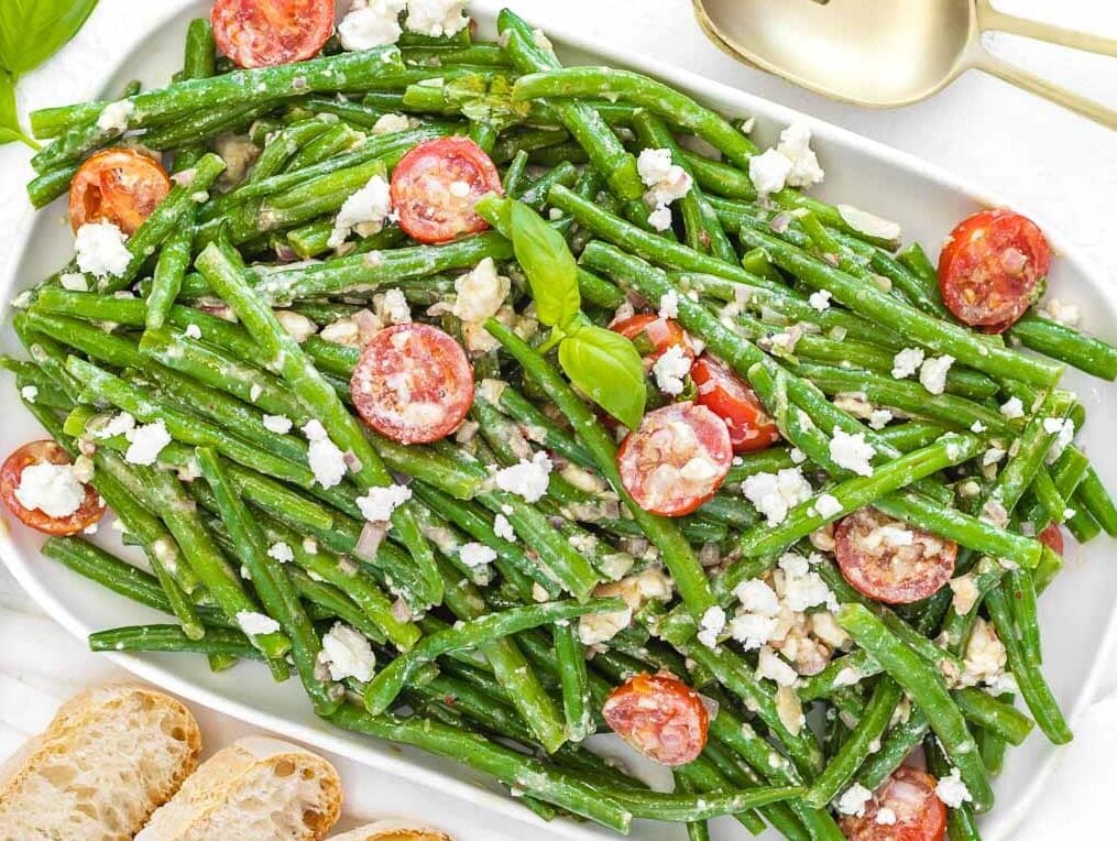 green bean salad with creamy mustard dressing and tomatoes