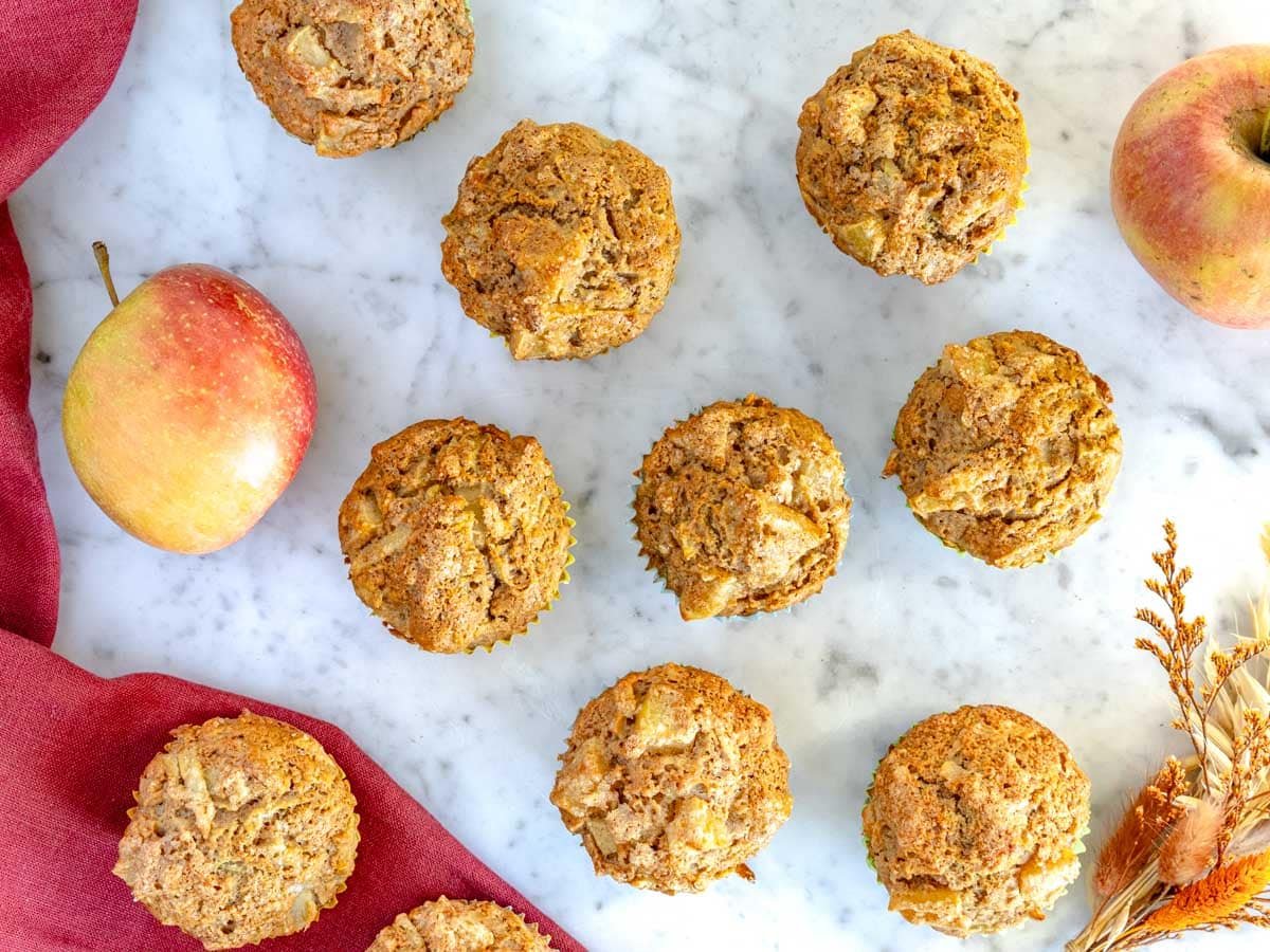 The apple muffins are just baked and are cooling down.