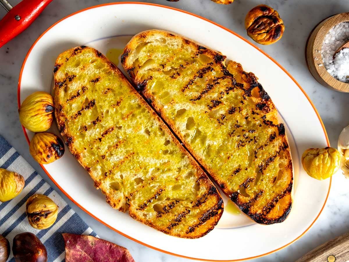 Homemade bread bruschetta with olive oil and roasted chestnuts