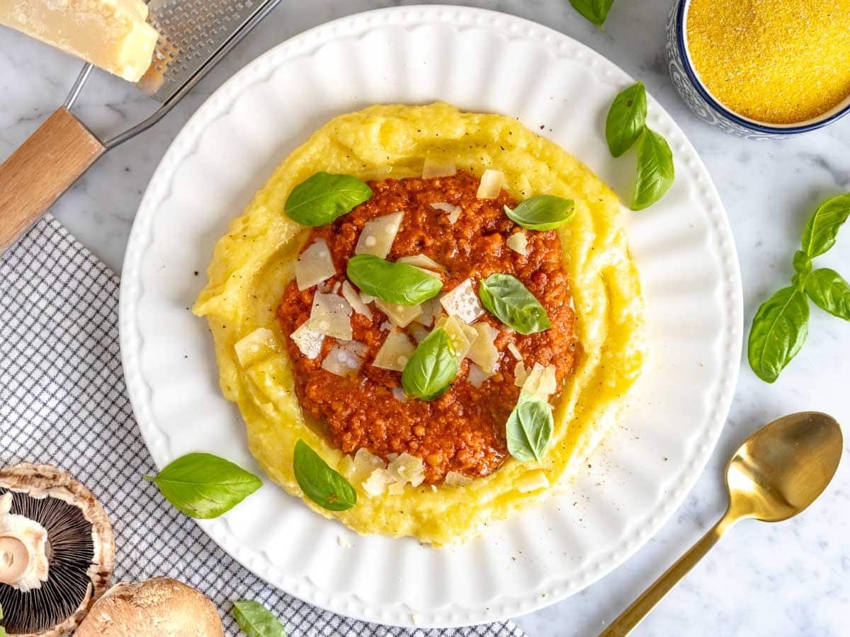 polenta with lentil bolognese and fresh basil