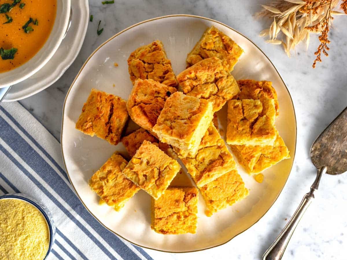 vegan cornbread slices on a white plate