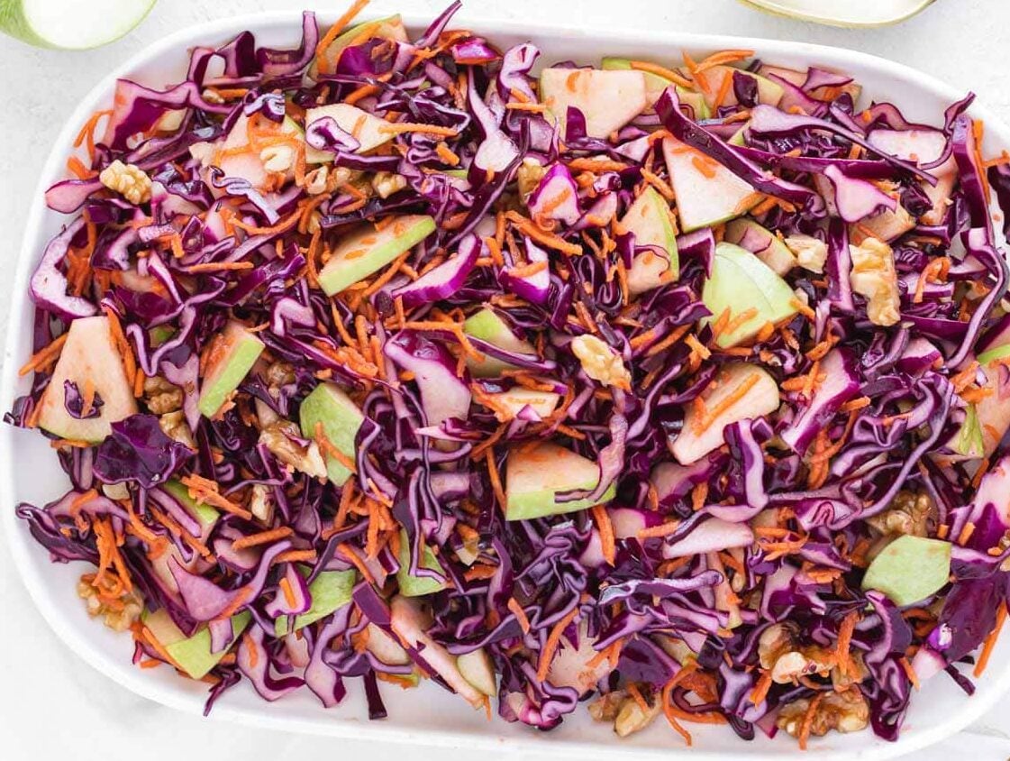 vinegar coleslaw on a white serving platter