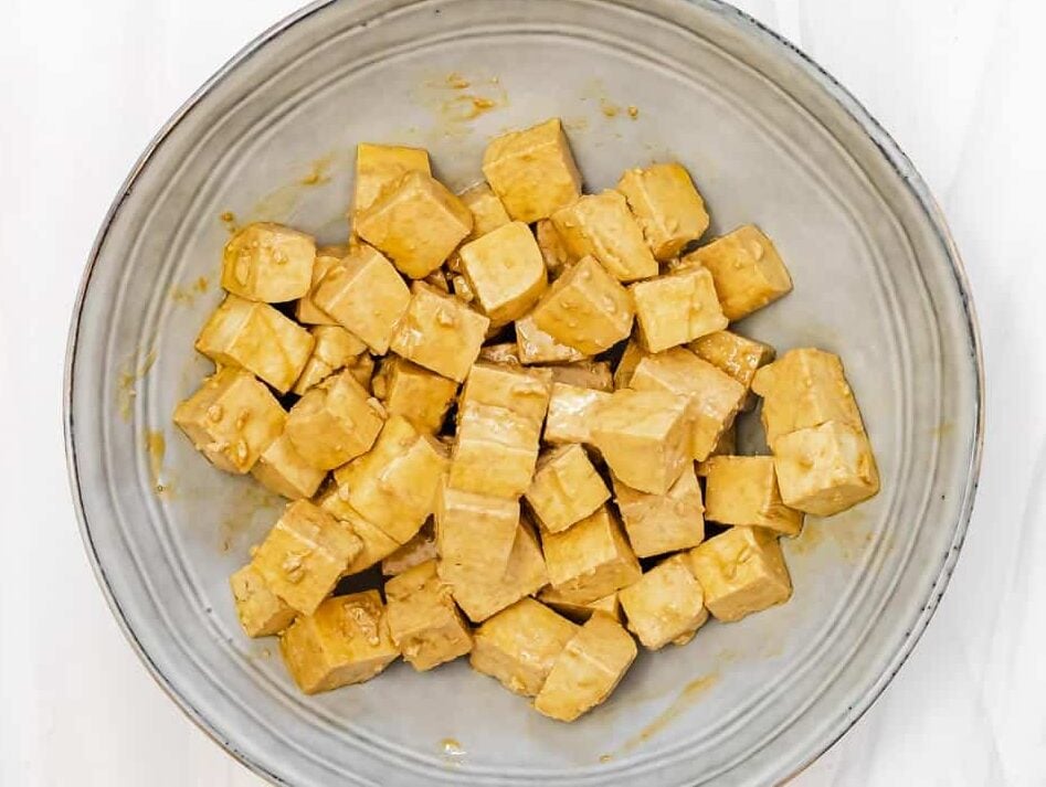 cubed tofu coated in olive oil, soy sauce, and corn starch