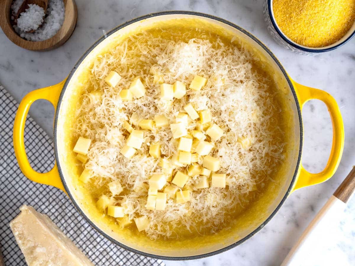 Polenta and cheese in a pot.