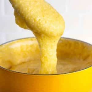 creamy polenta in a yellow pot