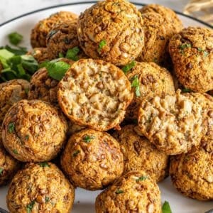 Italian-style lentil meatballs with golden edges and parsley.