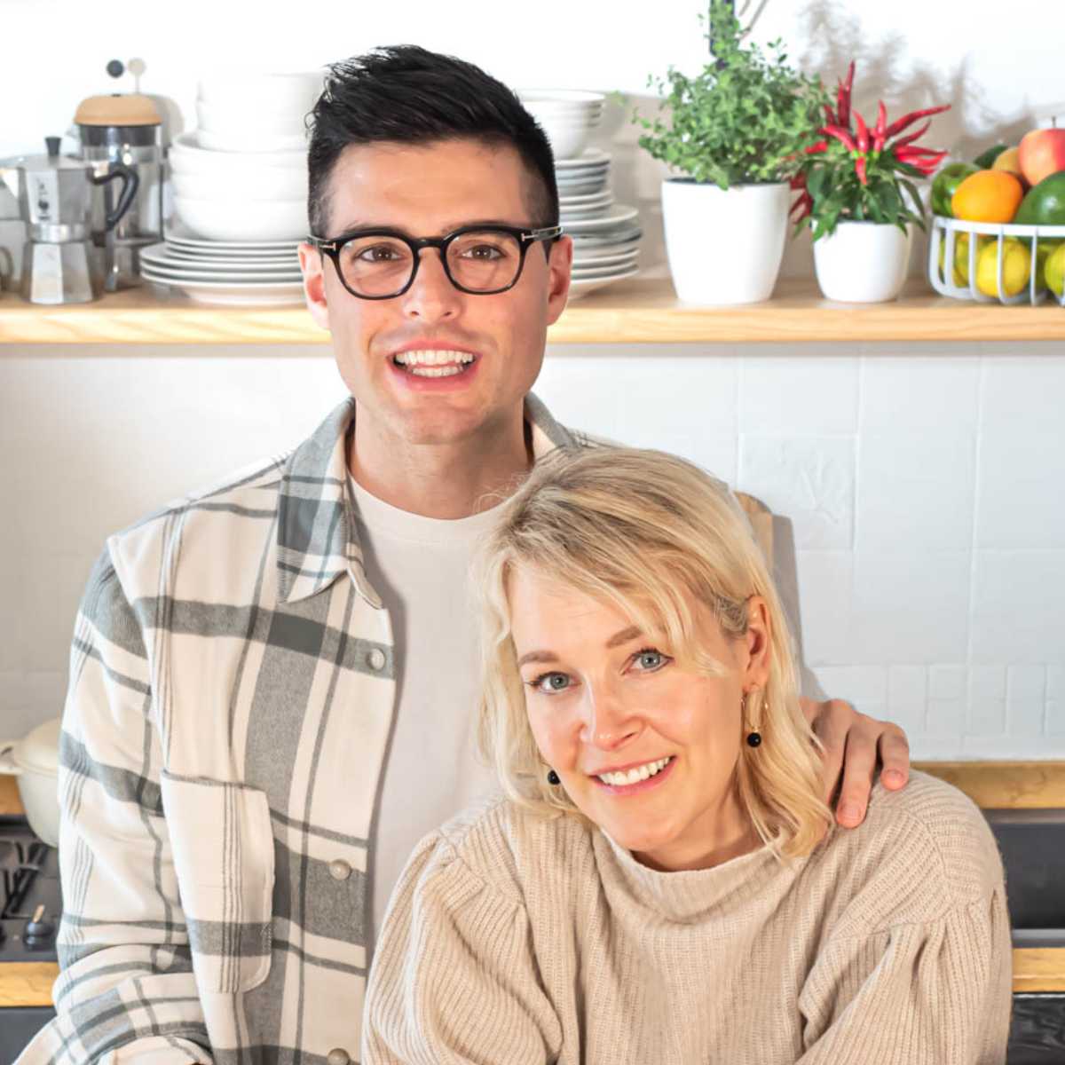 Nico and Louise in their kitchen.