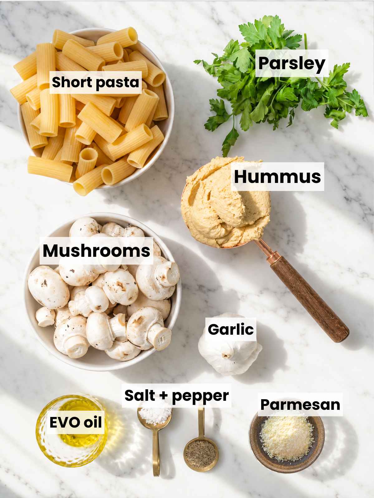 Pasta, mushrooms, hummus, garlic, parsley, olive oil, Parmesan, and seasonings