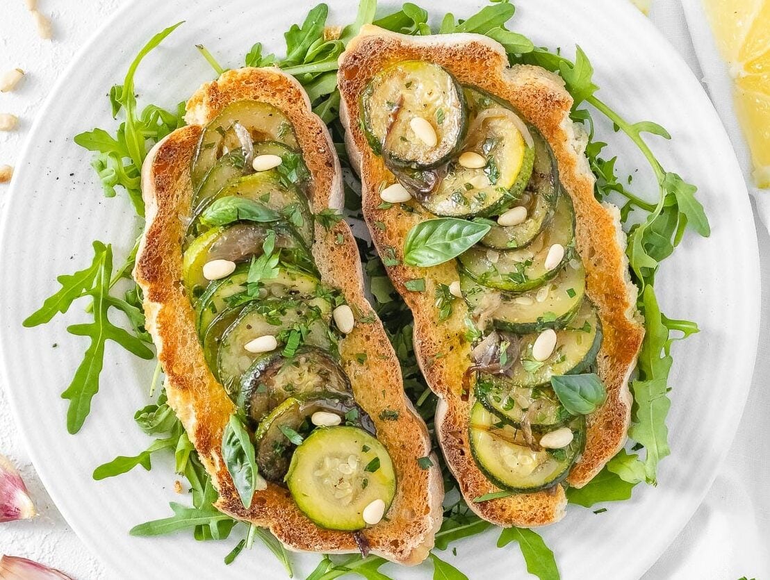 bruschetta with fried zucchini, pine nuts, and basil