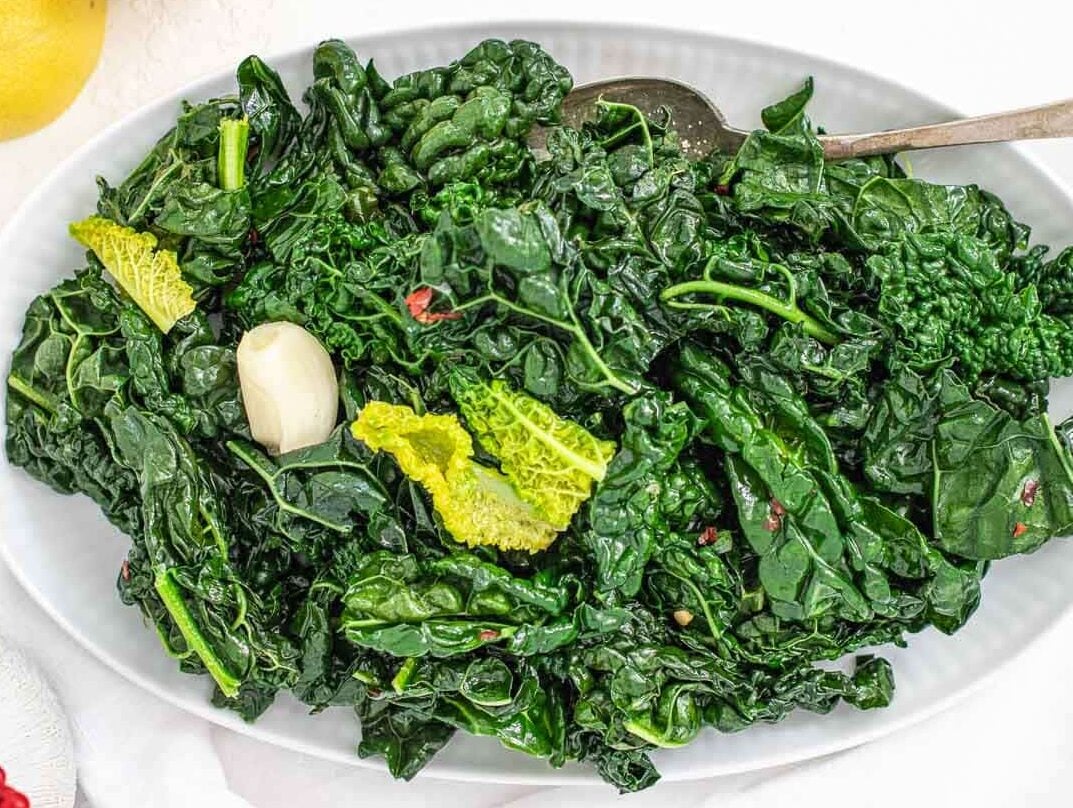 Sauteed kale on a white platter