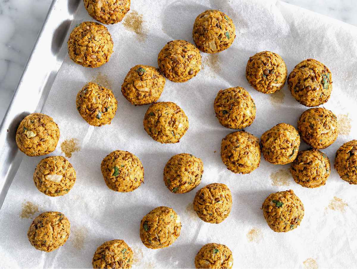 Step 3 Baked lentil meatballs with golden, lightly crisp edges fresh from oven.