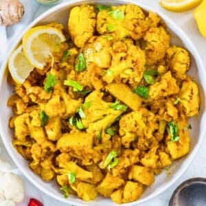 aloo gobi with lemon slices.