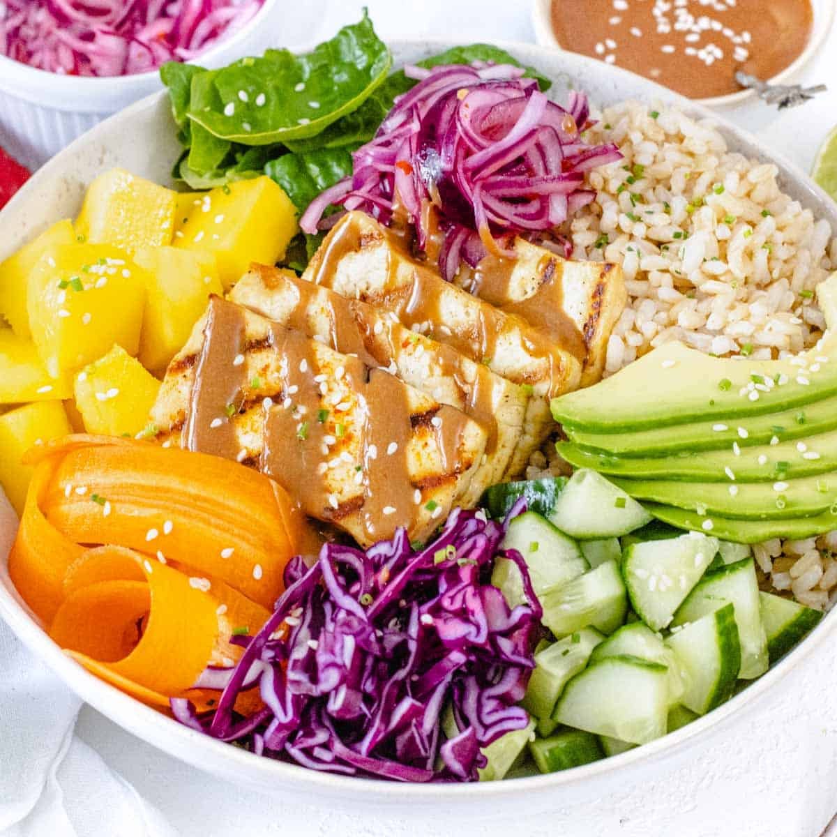 buddha protein bowl with peanut sauce and fresh vegetables.