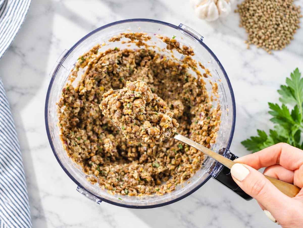 Step 1 Lentil patty mixture pulsed until combined while retaining visible lentil and herb texture.