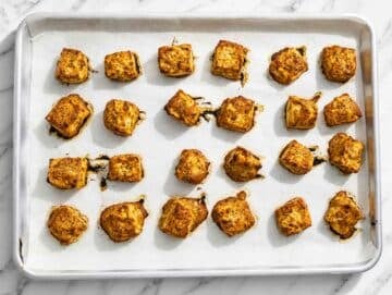 Step 4 Golden baked marinated tofu fresh from the oven with crisp browned edges.