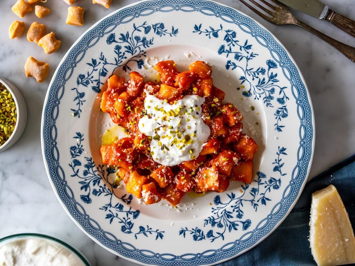 Sweet potato gnocchi with marinara sauce, burrata, and parmesan.