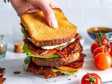 Vegan bacon lettuce and tomato sandwich with tempeh bacon.