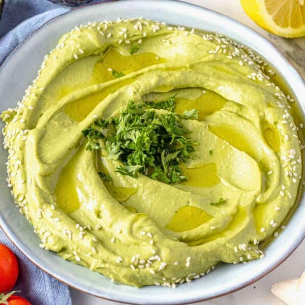 Avocado spread on a serving plate.