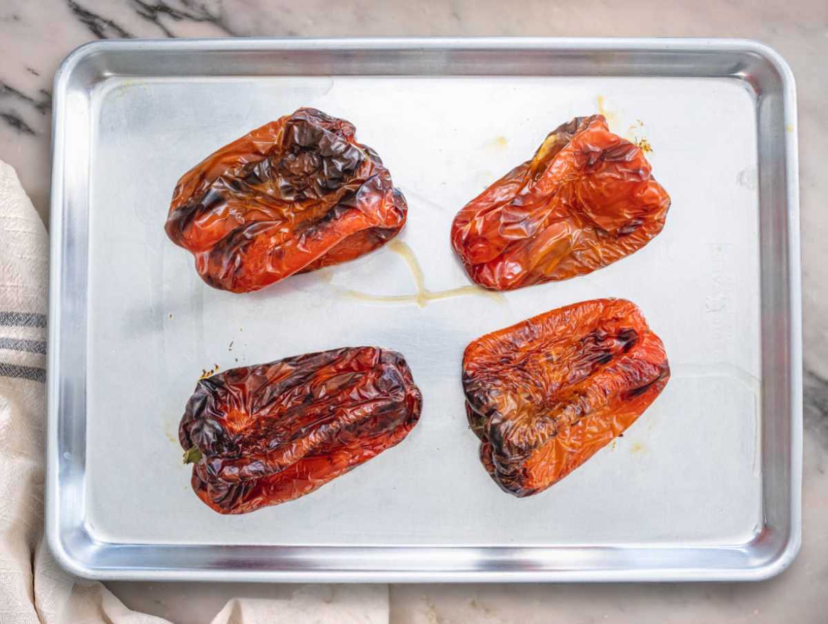 Roasted peppers on a baking tray right out of the oven.