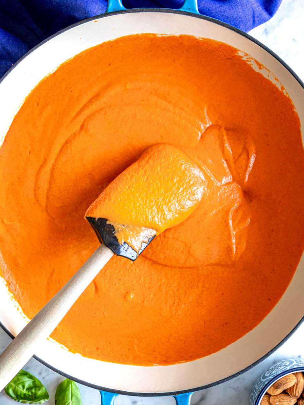 Roasted red pepper sauce in a skillet.