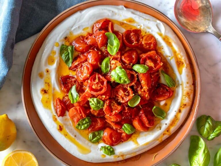 Whipped ricotta topped with confit tomatoes.