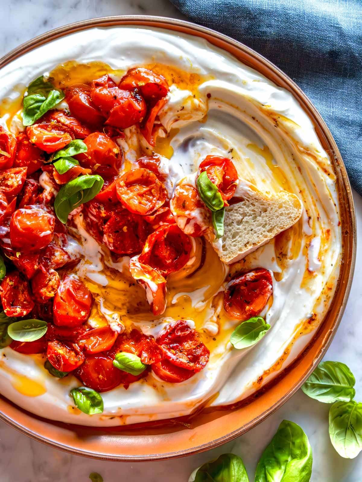 Whipped ricotta with cherry tomatoes and olive oil.